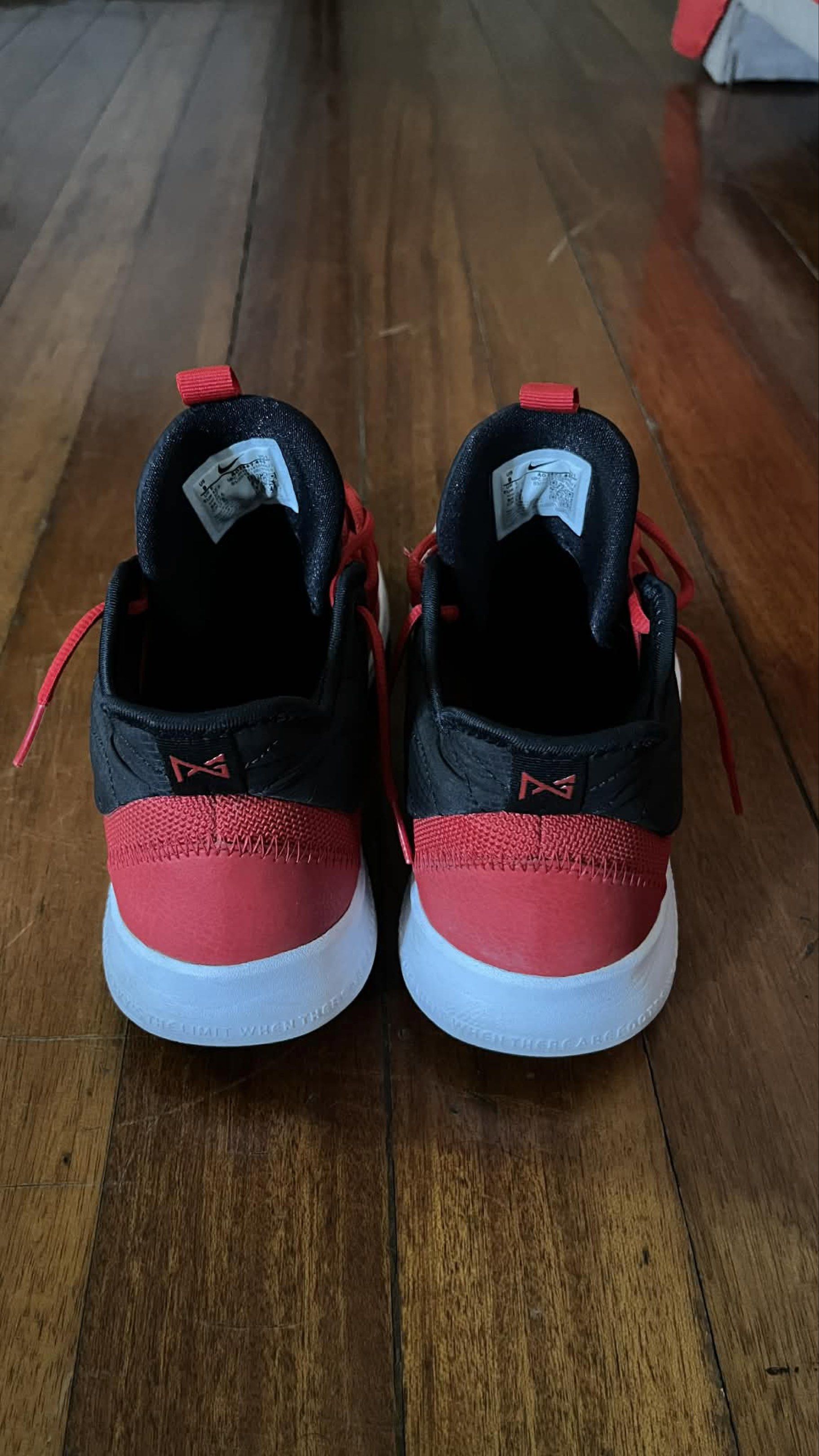 Nike PG 3 Red Basketball Shoes (Category: Sneakers) located in Paranaque City. Submitted by kim_mint (Listing ID 1424263280, Image 2). Description: The price is negotiable, just PM. SF will be shouldered by the buyer. - Complete with box - Nike PG 3 basketball shoes - Red and black color scheme - Red laces and upper with black accents - Black soles with red detailing - PG logo on tongue and heel RFS: Decluttering Loc: Parañaque City.