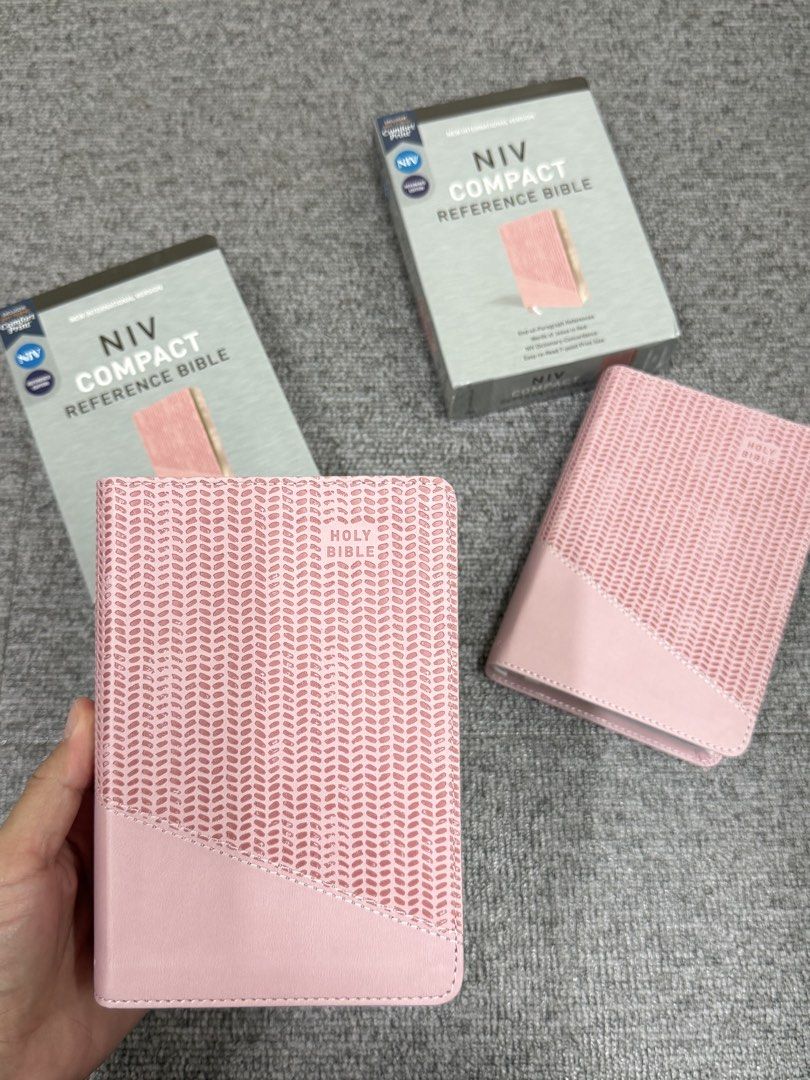 NIV compact Pink Bible (Category: Religion Books) located in Valencia. Submitted by pawprint22 (Listing ID 1424202641, Image 1). Description: Features: Complete text of the accurate, readable, and clear New International Version (NIV) Convenient, portable size Double-column format Presentation page Two satin ribbon markers Words of Jesus in red NIV dictionary/concordance Eight pages of full-color maps Exclusive Zondervan NIV Comfort Print typefac