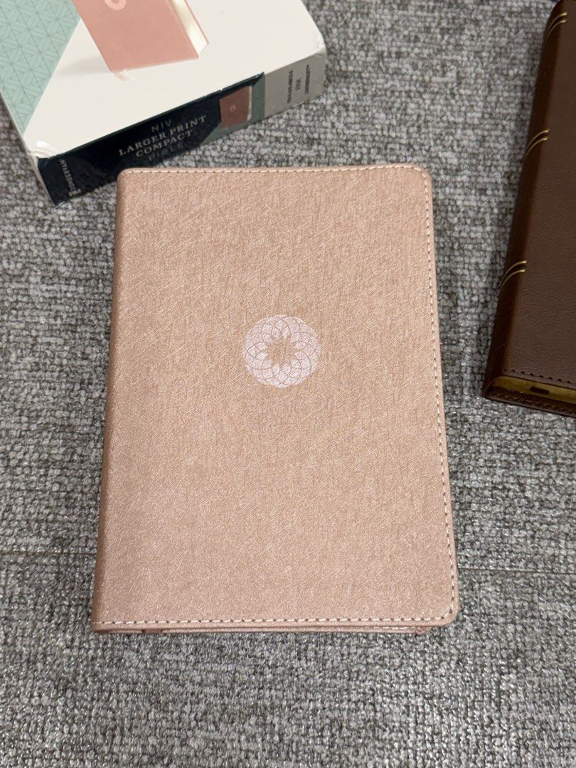 NIV Larger Print Compact Bible PINK (Category: Religion Books) located in Valencia. Submitted by pawprint22 (Listing ID 1424203124, Image 2). Description: - NIV Larger Print Compact Bible - Pink cover with floral design - Includes matching pink case - Comes with original box Features: Complete text of the accurate, readable, and clear New International Version (NIV) Convenient, portable size Double-column, paragraph format Presentation page Two s