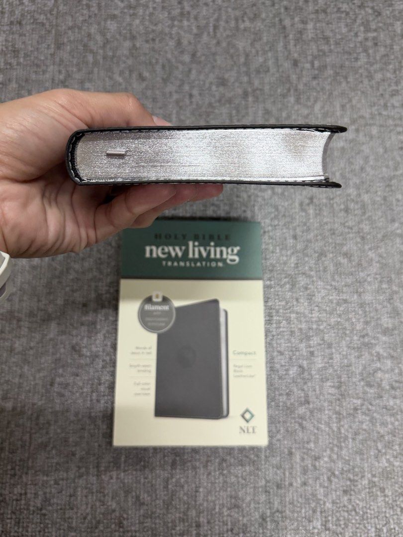 NLT Compact Bible, Filament Enabled (Category: Religion Books) located in Valencia. Submitted by pawprint22 (Listing ID 1424201757, Image 2). Description: Special features of this NLT Bible include: Words of Jesus in red Full-color Visual Overview of the Bible Full access to the Filament Bible app Lay-flat Smyth-sewn binding 6-point font Ribbon marker Presentation page This convenient, compact Bible makes a perfect gift for teens, young adults, a