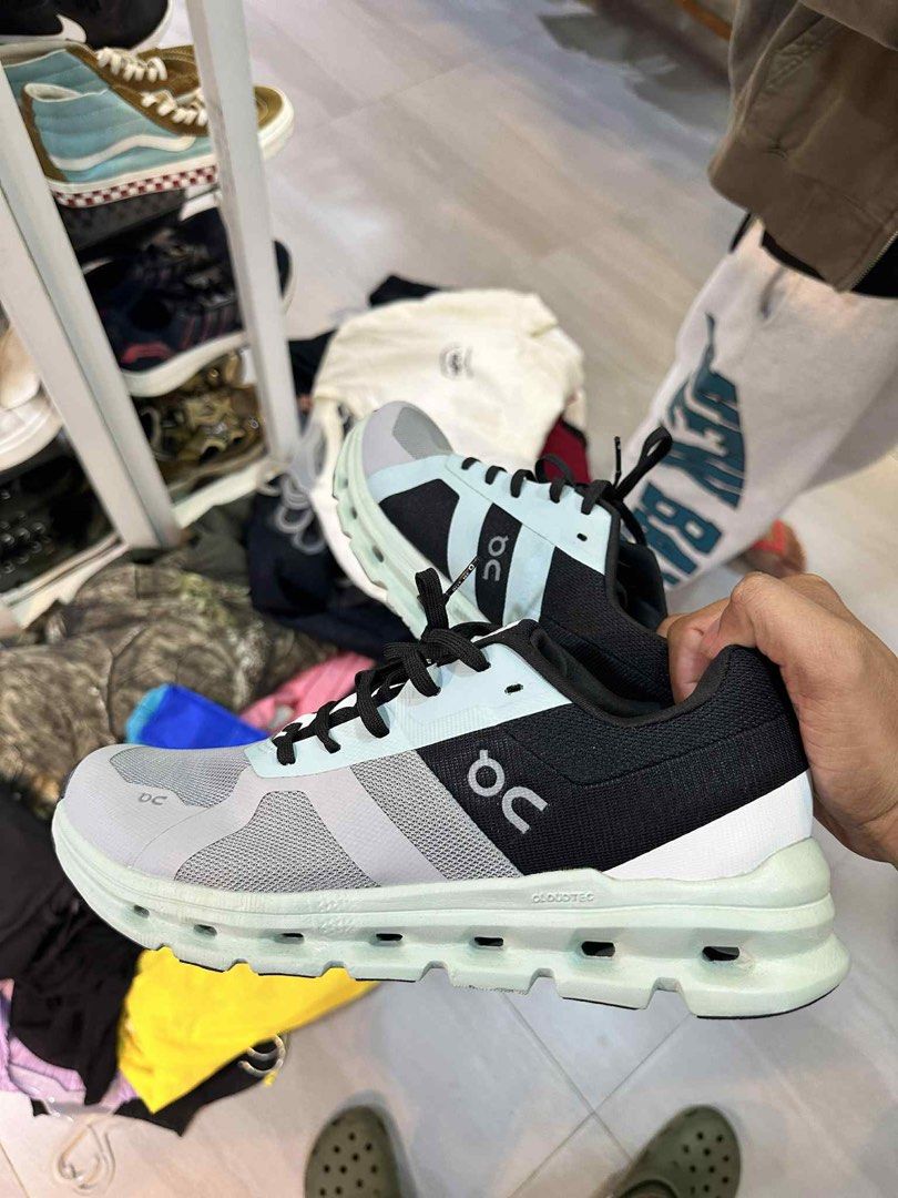On CloudTec Running Shoes - US 9.5 (Category: Sneakers) located in Dagupan City. Submitted by copcity.ph (Listing ID 1424183667, Image 3). Description: - On CloudTec running shoes - Color: Black and Light Blue - Size: US 9.5, EU 43, JP 27.5 - Features: Mesh upper, cushioned sole - Made in Vietnam - Swiss Engineering.