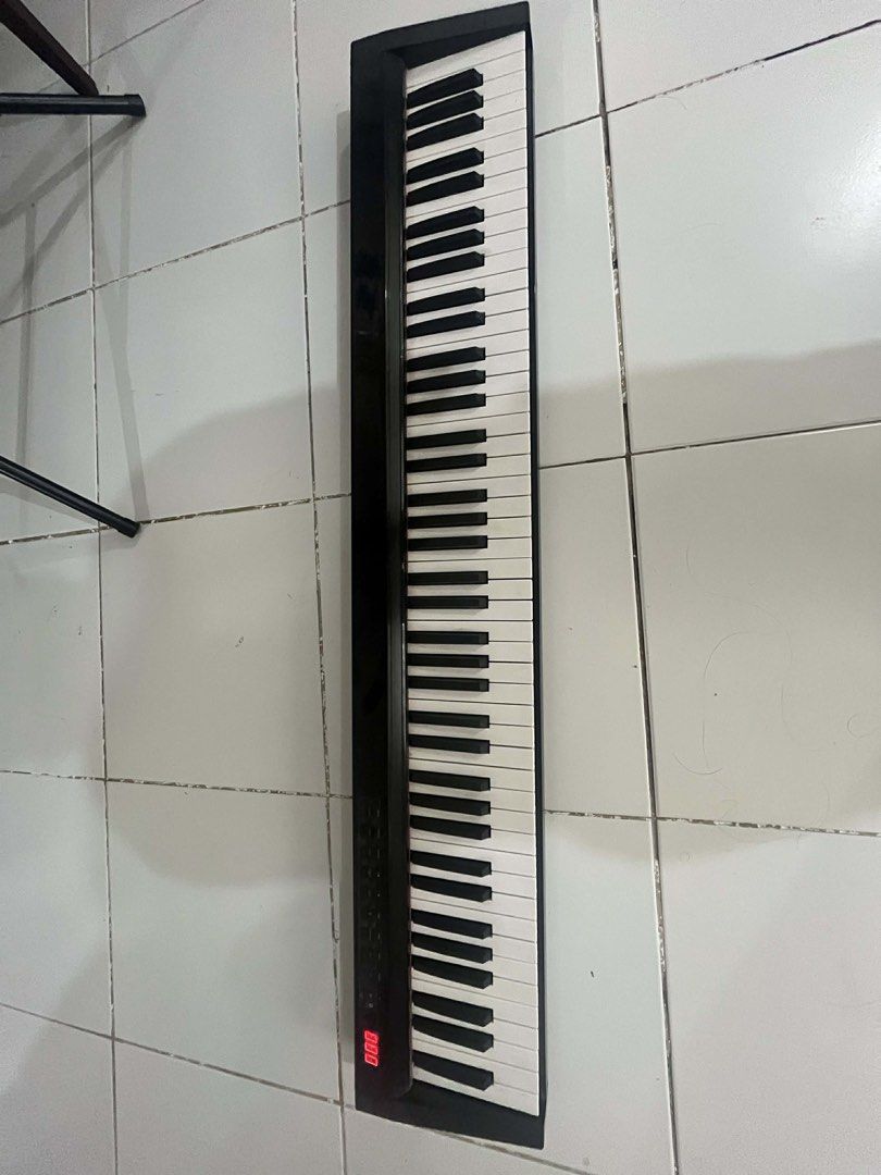 Piano (Category: Musical Instruments) located in Manila. Submitted by joyzelew22 (Listing ID 1424248458, Image 3). Description: Digital piano with full keyboard ₱5,000 Original Price: ₱15,000 digital display, and function buttons. Keys are black and white. In good working condition. No flaws.