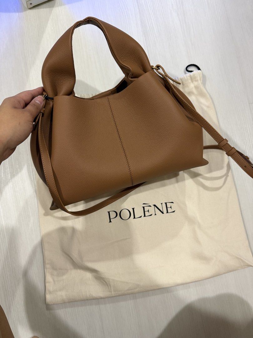 Polène NEUF (BRAND NEW) (Category: Luxury Bags & Wallets) located in Quezon City. Submitted by camille2026new (Listing ID 1424184785, Image 3). Description: - Polène Numéro Neuf handbag/ Crossbody - Color: Tan - Features a top handle and detachable shoulder strap - Includes dust bag - Magnetic closure No more box super big kasi — Bought it at Japan .