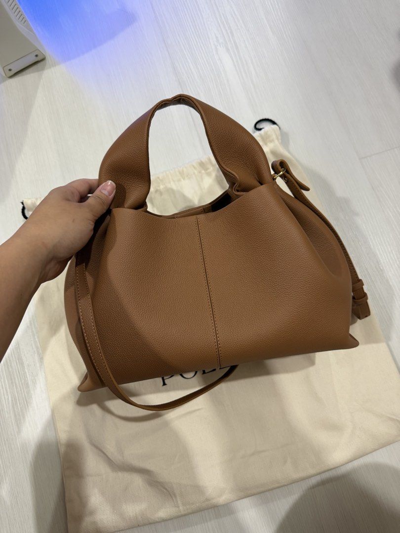 Polène NEUF (BRAND NEW) (Category: Luxury Bags & Wallets) located in Quezon City. Submitted by camille2026new (Listing ID 1424184785, Image 1). Description: - Polène Numéro Neuf handbag/ Crossbody - Color: Tan - Features a top handle and detachable shoulder strap - Includes dust bag - Magnetic closure No more box super big kasi — Bought it at Japan .