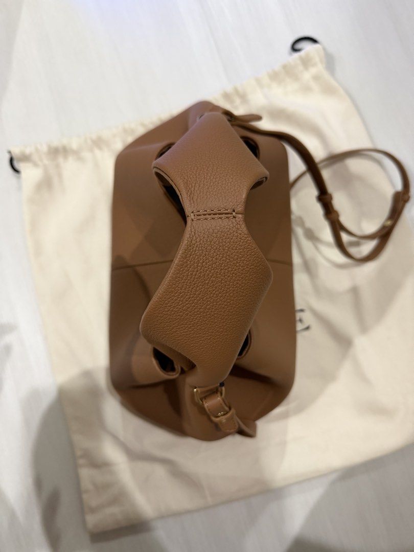 Polène NEUF (BRAND NEW) (Category: Luxury Bags & Wallets) located in Quezon City. Submitted by camille2026new (Listing ID 1424184785, Image 2). Description: - Polène Numéro Neuf handbag/ Crossbody - Color: Tan - Features a top handle and detachable shoulder strap - Includes dust bag - Magnetic closure No more box super big kasi — Bought it at Japan .