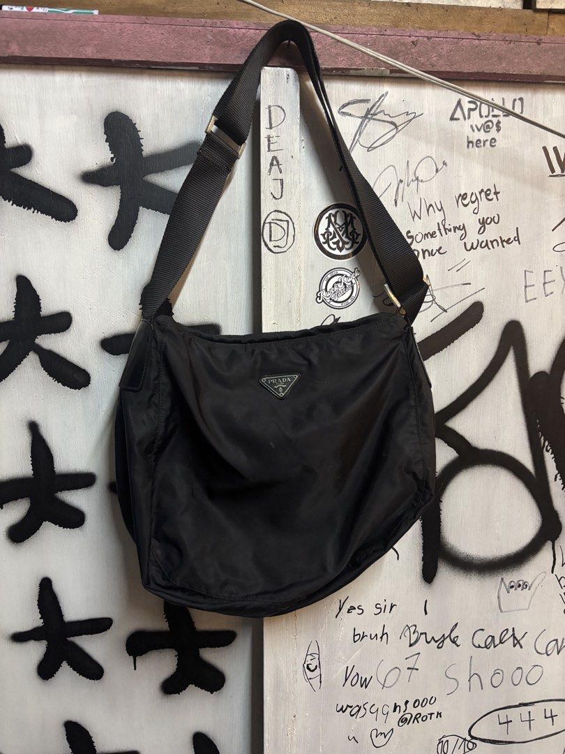 prada sling bag (Category: Luxury Bags & Wallets) located in Quezon City. Submitted by tarphouse (Listing ID 1424326348, Image 1). Description: - Prada sling bag - Black color - Crossbody style - Authentic Prada - Classic design.
