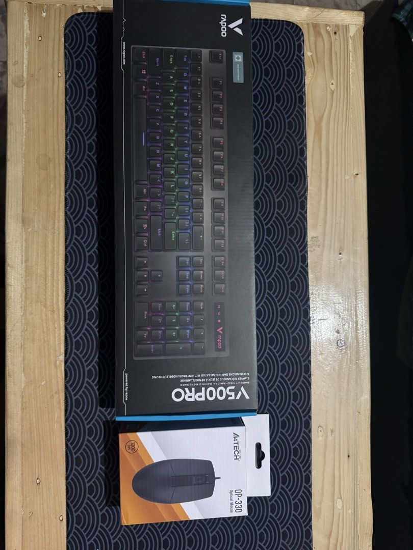 Rapoo V500PRO Keyboard and A4Tech OP-330 Mouse (Category: Computer Keyboard) located in Navotas City. Submitted by bayntotmo (Listing ID 1424187788, Image 1). Description: - Rapoo V500PRO RGB Keyboard - A4Tech OP-330 Optical Mouse (Black) - Both items are brand new. - Comes in original packaging..