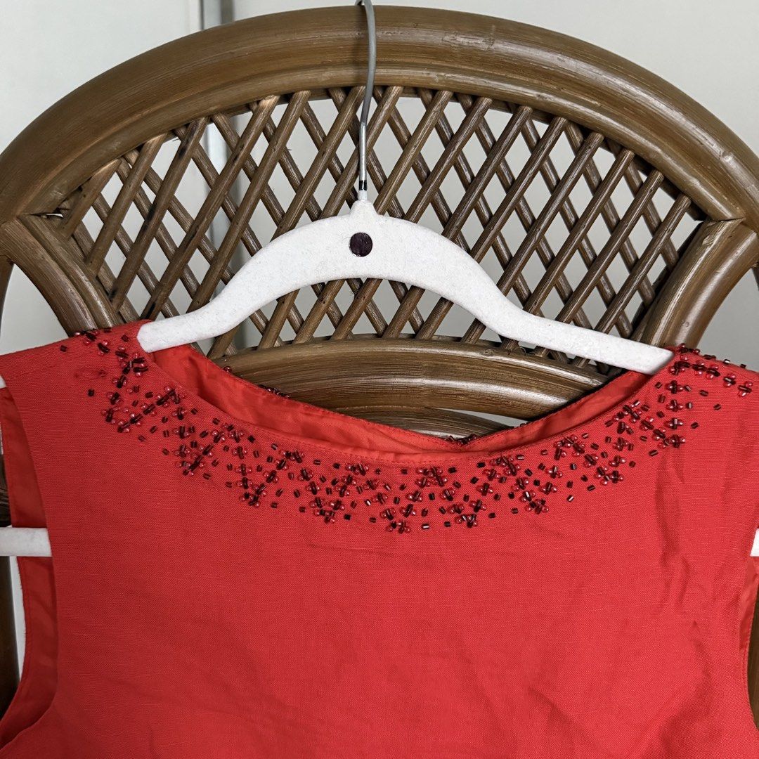 Red Linen Top with Beaded Detail (Category: Sleeveless) located in Tarlac. Submitted by gemini___sun (Listing ID 1424268518, Image 3). Description: - Red linen blend - Round neckline with beaded - Size 2 .