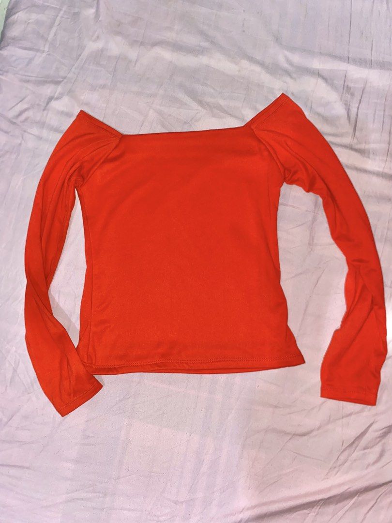 Red Off-Shoulder Long Sleeve Top (Category: Longsleeves) located in Mariveles. Submitted by preluvbaddie (Listing ID 1424289226, Image 1). Description: - Red off-shoulder top - Long sleeves - Square neckline - Fitted silhouette - Smooth, stretchy fabric - Versatile for day or night wear - Easy to pair with different bottoms.
