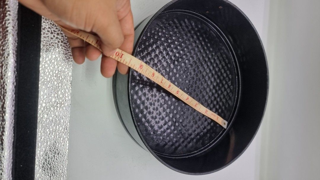 Round Cake Pan 10" (Category: Bakeware) located in Marikina City. Submitted by andreah_16 (Listing ID 1424335351, Image 1). Description: - 10-inch round cake pan - Features a textured bottom - Ideal for baking cakes - Durable black color - Suitable for various cake recipes - Great addition to your baking tools.