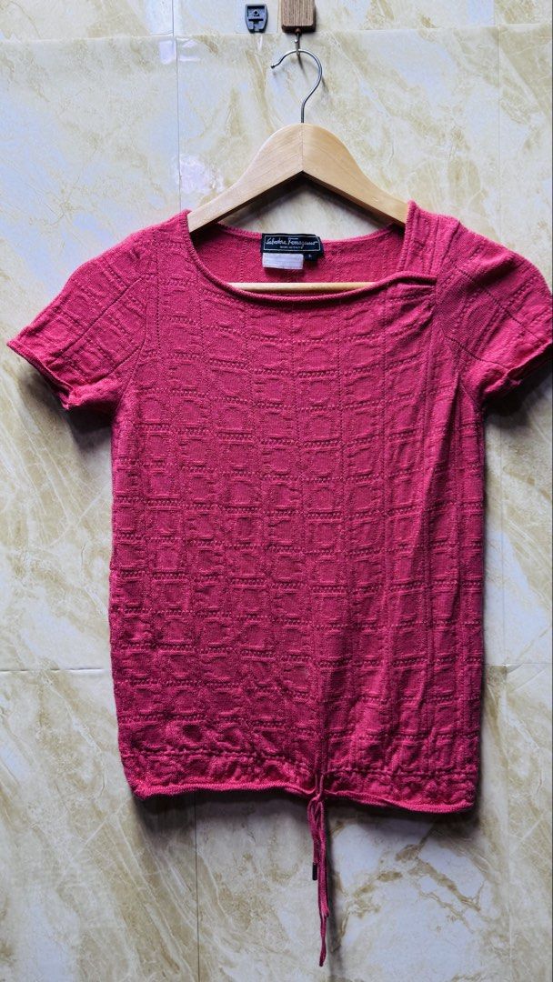 Salvatore Ferragamo Pink Top (Category: Luxury Apparel) located in Batangas. Submitted by cjayf (Listing ID 1424284796, Image 1). Description: - Authentic Salvatore Ferragamo top - Square neckline - Short sleeves - Drawstring waist - Textured pink wool fabric - Made in Italy - Size S -Dimes 16x21.