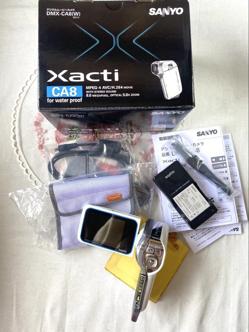 Sanyo Xacti CA8 (Category: Cameras) located in Quezon City. Submitted by helloclassiques (Listing ID 1424325630, Image 1). Description: Perfect for taking photos & videos! 📸🎞️ All buttons and flash are working. Fully functional! ✨ ⋆｡‧˚ʚ🧸ɞ˚‧｡⋆ Comes with original box and pouch! Specs: 8 MP 5x optical zoom 2.5” LCD screen CMOS sensor Memory type: SD card 🏷️Price: ₱8,000 Inclusions: Original box with accessories Camera pouch ˙✧˖°📷 ༘ ⋆｡˚All phot
