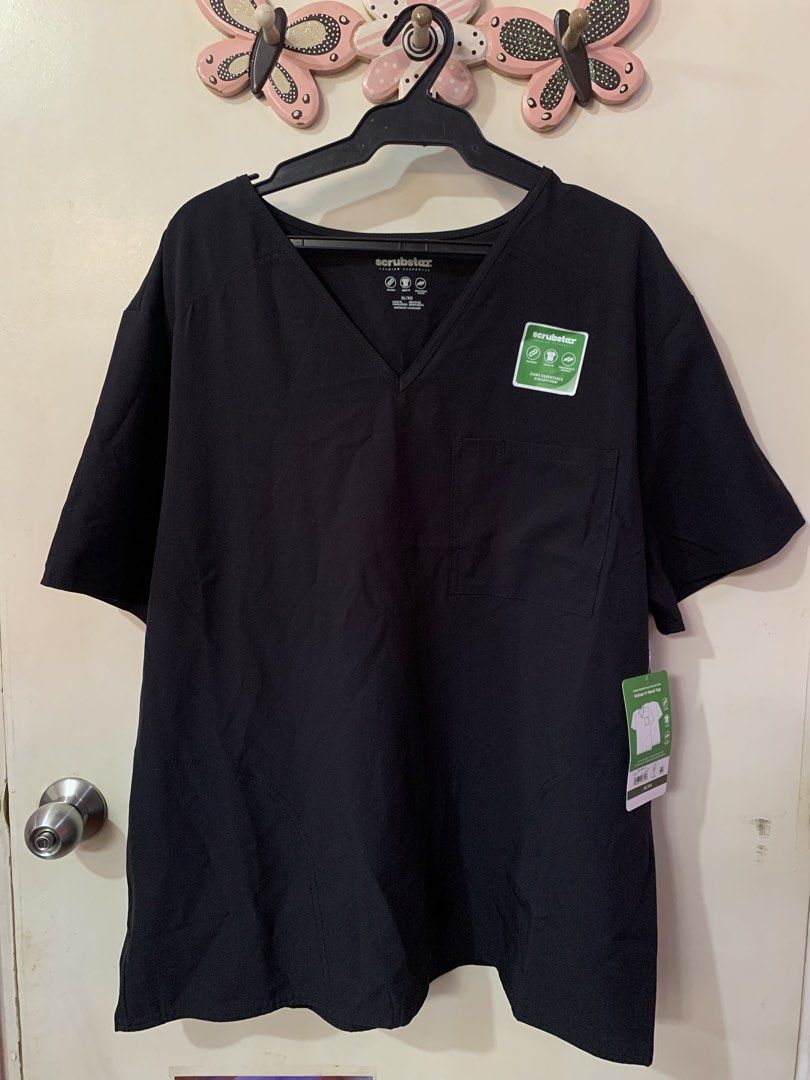 Scrubstar plus size black scrubs top XL (Category: Blouses) located in Las Pinas. Submitted by extraloved.ph (Listing ID 1424206989, Image 1). Description: Brand new from US Never worn Still with tag With side pockets Comfy for plus sizes on duty :)) DM for dimensions.