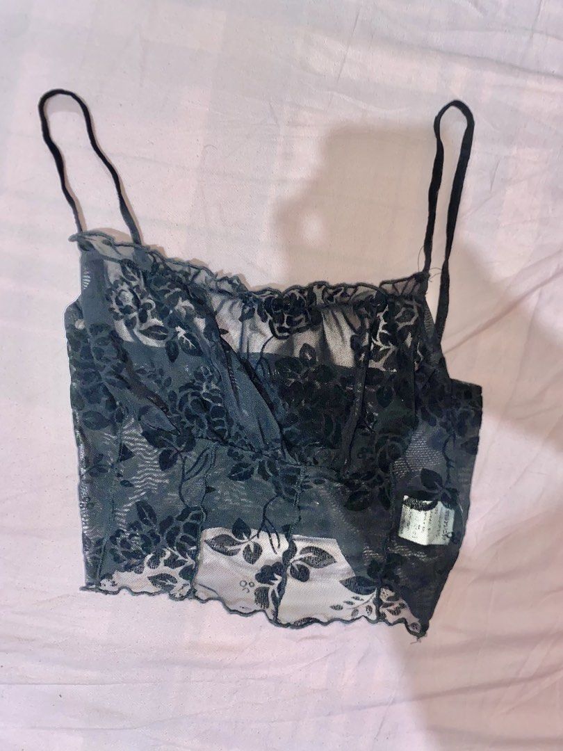 Sexy Black Lace Crop Top (Category: Others Tops) located in Mariveles. Submitted by preluvbaddie (Listing ID 1424210978, Image 1). Description: - Black lace crop top - Delicate floral patterns - Thin straps - Ruffled neckline and hem - Fitted style - Soft, slightly sheer fabric - Great for layering.