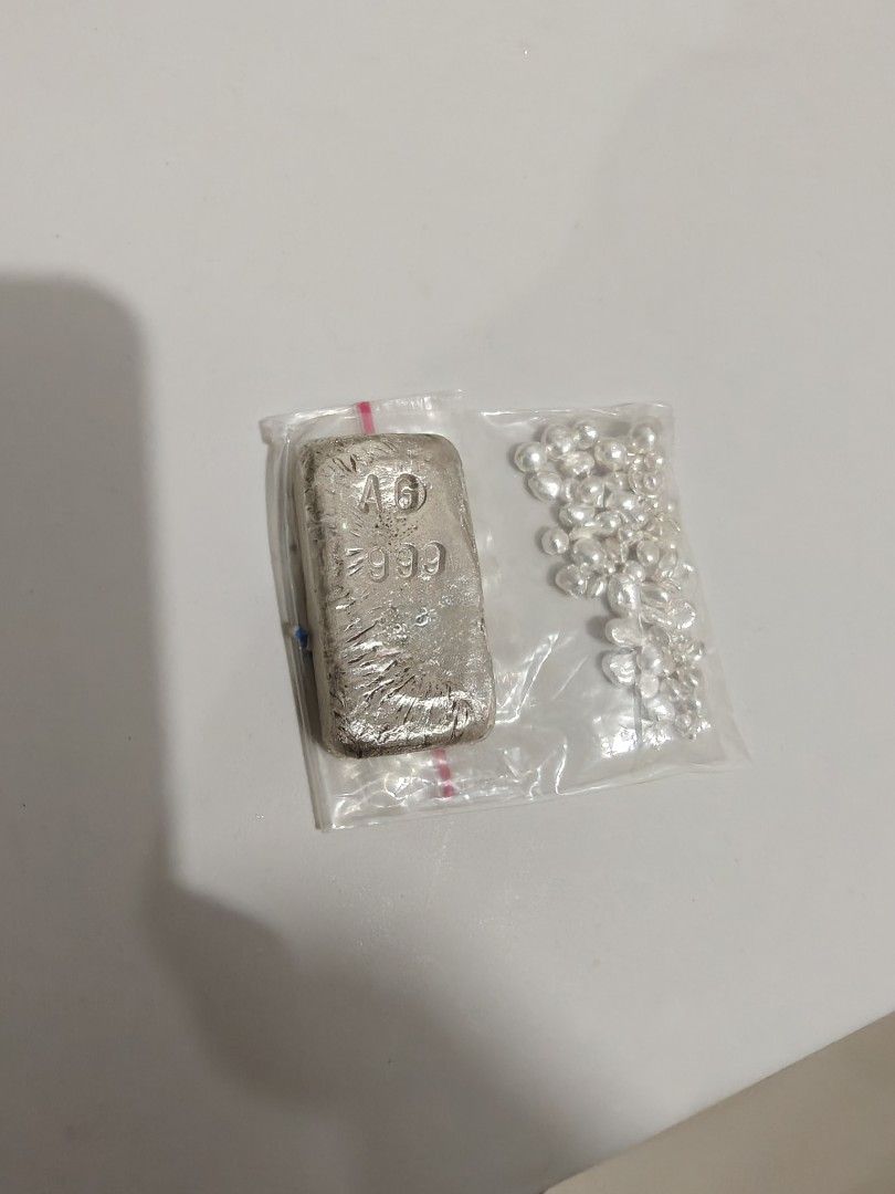 Silver Bar and Silver popcorn (Category: Currency) located in Manila. Submitted by invoker_dota2 (Listing ID 1424239756, Image 3). Description: For Sale! Silver Bar & Popcorn Pure silver 999 Silver bar 101 grams Silver popcorn 20 grams 121 grams total 250 per gram Meet up or Pick up Pm! Pm!.