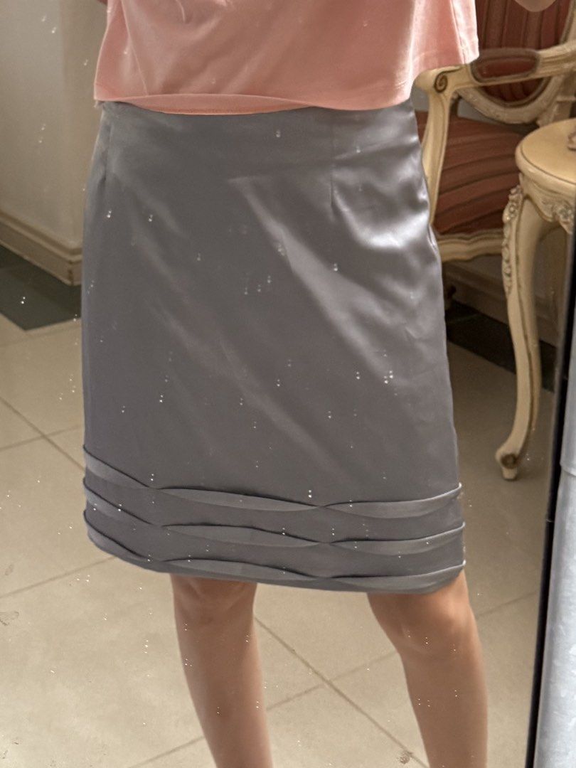 Silver satin Mini Skirt with details (Category: Skirts) located in Makati City. Submitted by blingbinz (Listing ID 1424208587, Image 2). Description: - waist 26 - silver satin.