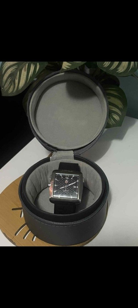 Tag Heuer Golf Watch (Category: Luxury Watches) located in Meycauayan. Submitted by redvipergf (Listing ID 1424184328, Image 3). Description: - Tag Heuer Golf Watch - Black dial and strap - Includes original case - Engraved with "GOLF WATCH by TAG Heuer" and "TIGER WOODS PROOF" - Date display at 3 o'clock.