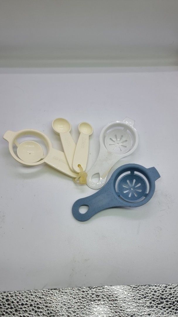 Take all Egg lMeasuring Spoons Set (Category: Bakeware) located in Marikina City. Submitted by andreah_16 (Listing ID 1424334274, Image 2). Description: - Includes two egg separators (white & blue). - Easily separate egg whites from yolks. - Comes with a set of measuring spoons. - Measuring spoons are attached. - Ideal for baking and cooking..