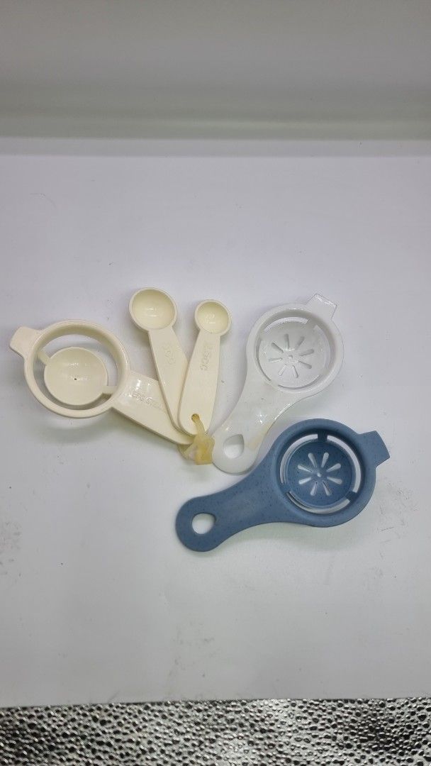 Take all Egg lMeasuring Spoons Set (Category: Bakeware) located in Marikina City. Submitted by andreah_16 (Listing ID 1424334274, Image 1). Description: - Includes two egg separators (white & blue). - Easily separate egg whites from yolks. - Comes with a set of measuring spoons. - Measuring spoons are attached. - Ideal for baking and cooking..
