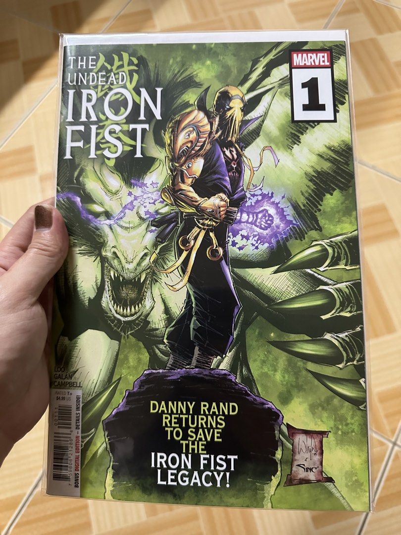 The Undead Iron Fist #1 Marvel Comic Book (Category: Comics & Manga) located in Binan City. Submitted by elf.0000 (Listing ID 1424291616, Image 1). Description: - Iron Fist #1 comic book - Features Danny Rand and the Iron Fist legacy - Published by Marvel - Includes bonus digital edition - Cover art: Character with golden mask and purple energy effects - Comes in a protective sleeve P350.00 plus sf In very fine condition Payment via gcash Ship th