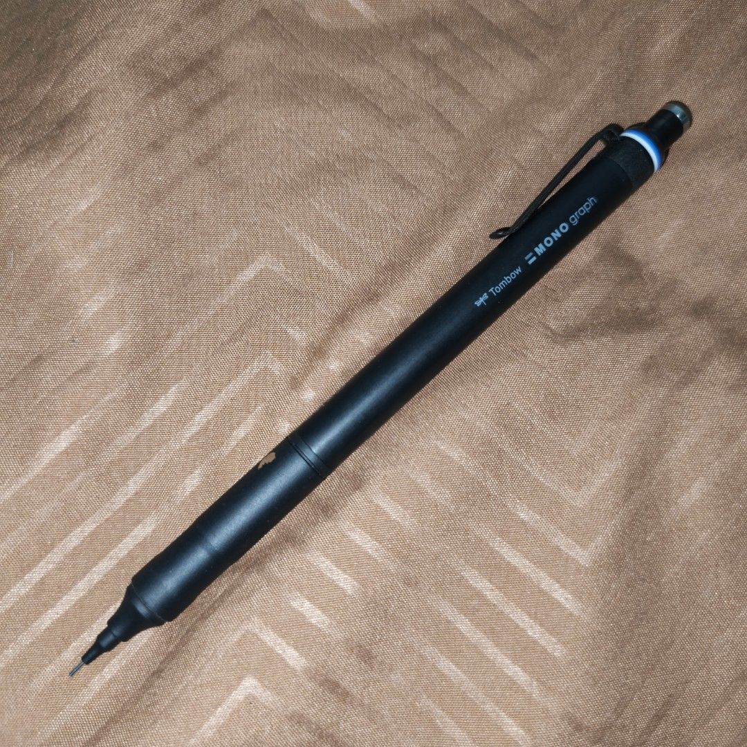 Tombow Mono Graph Fine (Category: Stationery & School Supplies) located in Caloocan City. Submitted by joziahrylandgelido (Listing ID 1424224557, Image 1). Description: Has a scratch on the grip section, does not affect performance. The eraser is also unused. .