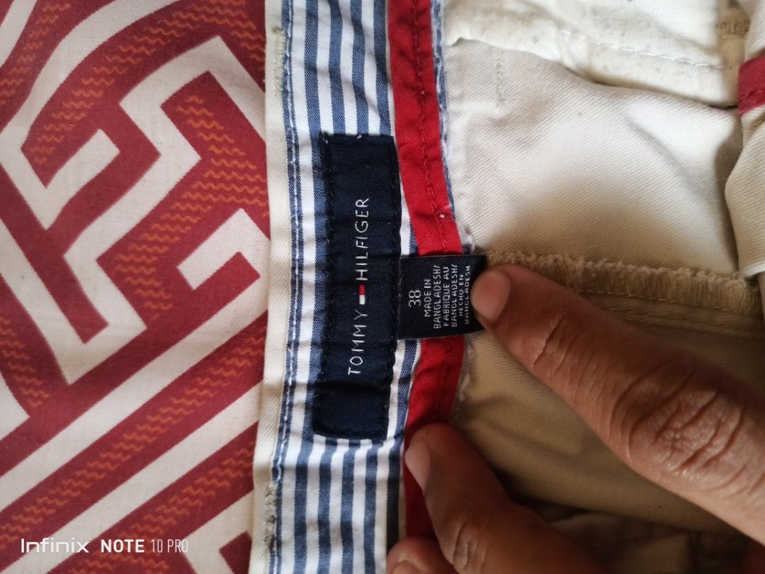 Tommy Hilfiger Khaki Shorts - Size 38 (Category: Shorts) located in Manila. Submitted by mr.dodoublegg (Listing ID 1424173375, Image 1). Description: size 38 on tag fit size 36.