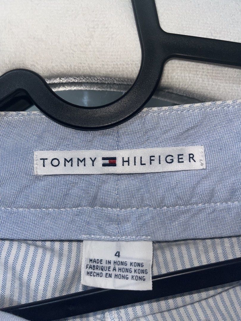 Tommy Hilfiger striped palm tree cropped pants (Category: Jeans) located in Valenzuela. Submitted by marinnette84771 (Listing ID 1424240039, Image 3). Description: Tommy Hilfiger pants Blue and white striped pattern Palm tree embroidery Wide leg cut Size 4/ 32 inch Button and zipper closure Cotton fabric Bought from Ireland orig price is 4k in php ps. not visible sa malayo yung mantsa rfs. decluttering .