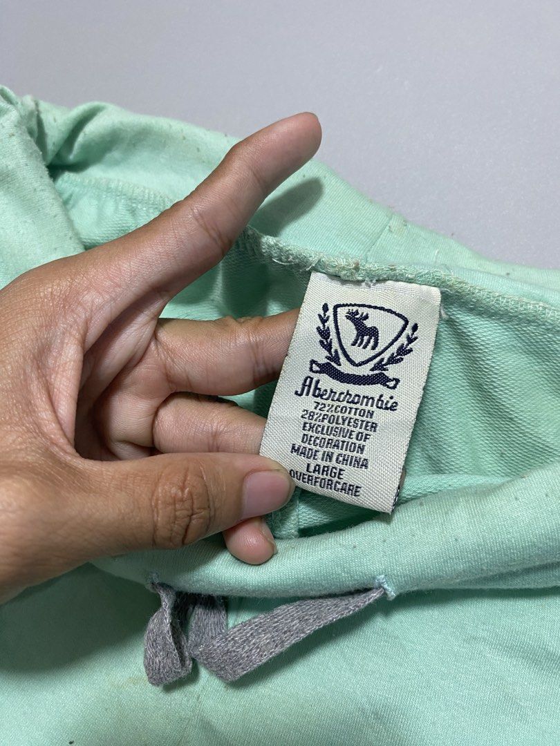 Y2k Abercrombie & Fitch Shorts (Category: Shorts) located in Manila. Submitted by y2kmatter (Listing ID 1424340545, Image 3). Description: - Abercrombie & Fitch shorts - Color: Mint Green - Size: Large - Features: Brand logo, drawstring waistband, two side pockets - Material: 72% cotton, 28% polyester - Made in China -Minor issue(Lints).