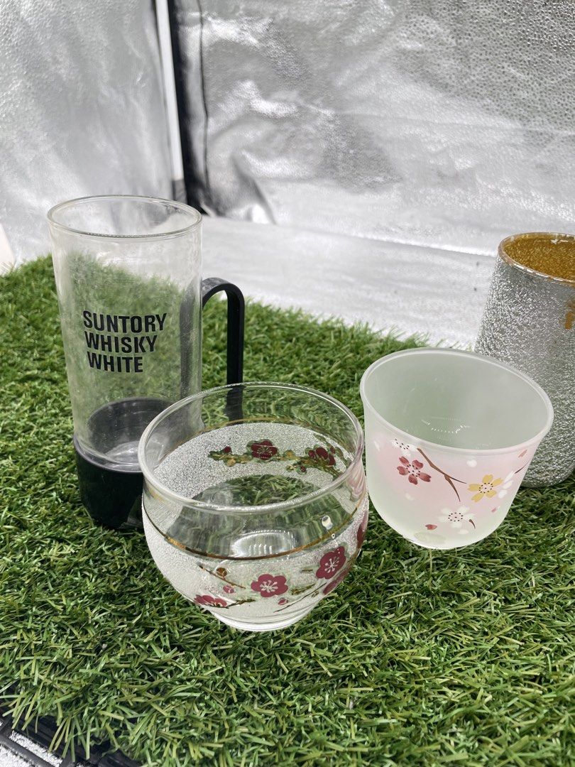 Assorted Glassware Set (Category: Other Kitchenware & Tableware) located in Quezon City. Submitted by eilgaraje (Listing ID 1427545774, Image 2). Description: Glassware set includes a Suntory Whisky White glass with a handle, a floral-decorated glass, a pink floral cup, and three silver and gold-rimmed glasses. Perfect for serving drinks or as decorative pieces. The set offers a variety of styles and sizes to suit different needs. Assorted.