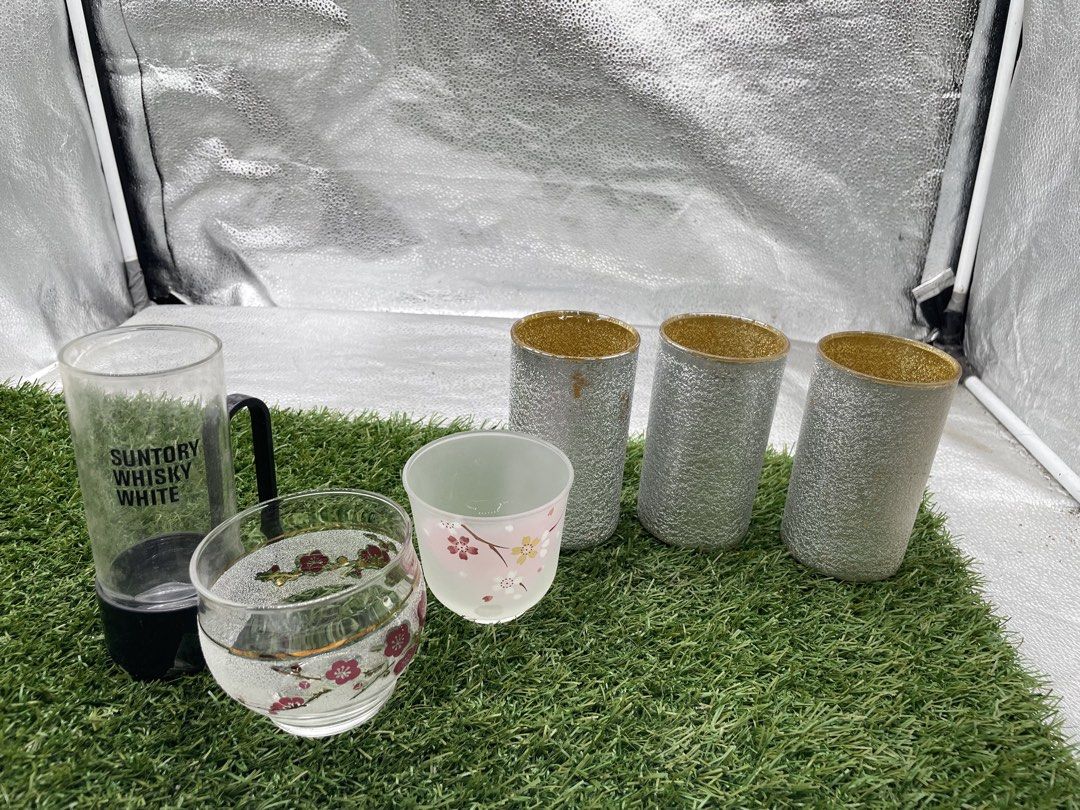 Assorted Glassware Set (Category: Other Kitchenware & Tableware) located in Quezon City. Submitted by eilgaraje (Listing ID 1427545774, Image 1). Description: Glassware set includes a Suntory Whisky White glass with a handle, a floral-decorated glass, a pink floral cup, and three silver and gold-rimmed glasses. Perfect for serving drinks or as decorative pieces. The set offers a variety of styles and sizes to suit different needs. Assorted.