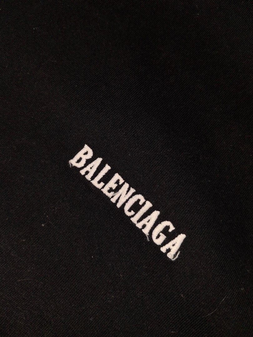 Balenciaga Unifit Black T-shirt (Category: Tshirts & Polo Shirts ) located in Bayambang. Submitted by ace_found_it_06 (Listing ID 1427527770, Image 2). Description: Black Balenciaga Unifit Distressed T-shirt. Features the Balenciaga logo on the front. Made in Italy. Size is XXL. The shirt has a round neck and short sleeves. - Ang kapal ng tela nito - Excellent Condition DM 📩📩 - Pangasinan Based.