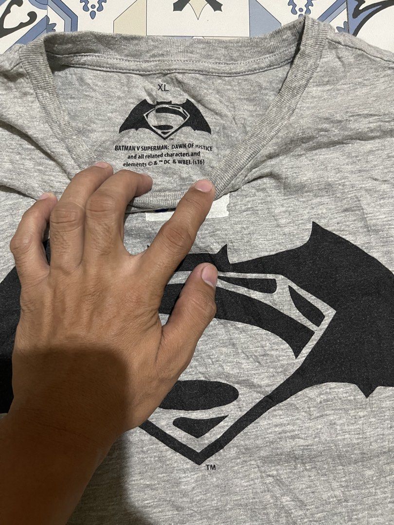 Batman v Superman T-shirt XL (Category: Tshirts & Polo Shirts ) located in Manila. Submitted by stuzzygod (Listing ID 1427632015, Image 2). Description: Batman Vs Superman (Printed🏷️) Dimes 21*26 Size Small Good condition Color rate 9/10 No issue.