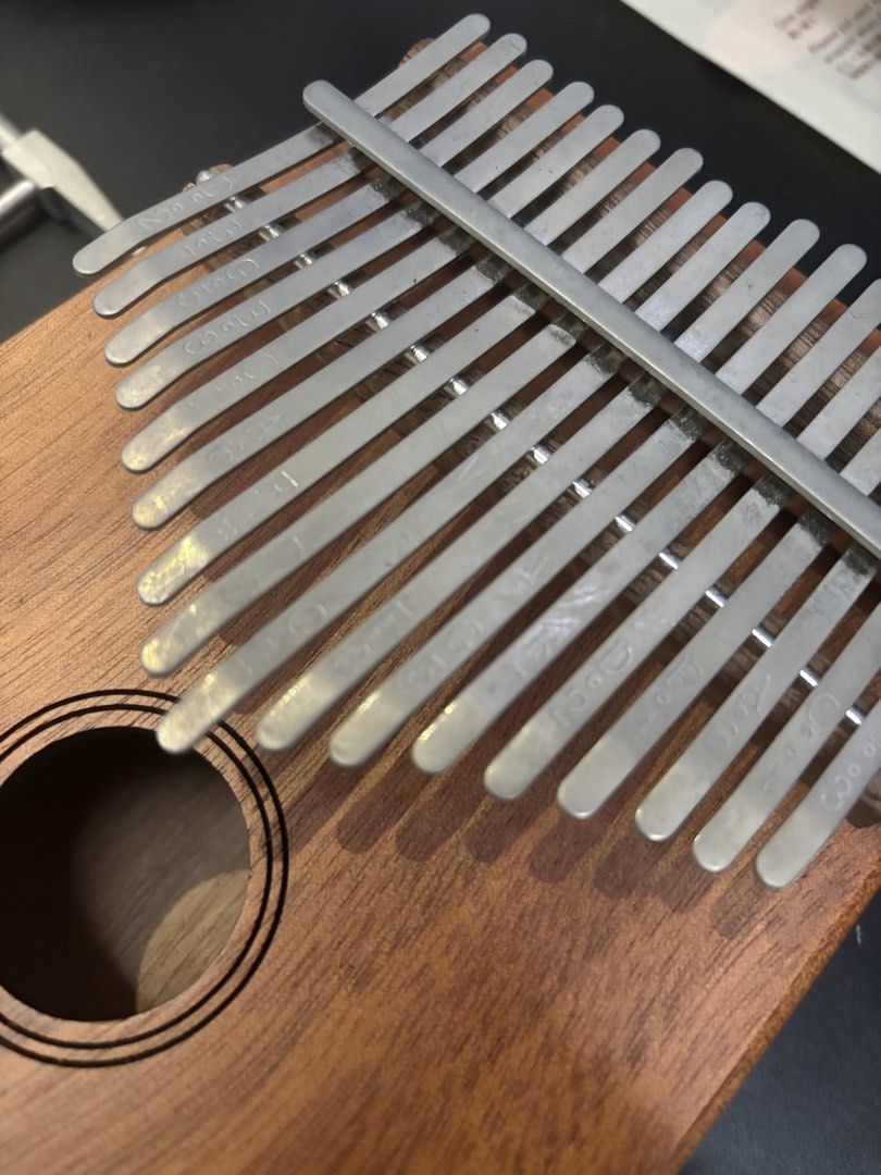 Ben & Bart Kalimba (Category: Musical Instruments) located in Pasig City. Submitted by lovebird30 (Listing ID 1427628679, Image 2). Description: - Used once or twice - Nakatambak lang - No issues - Needs a bit of cleaning - Comes with dust bag, hammer, and music sheet.