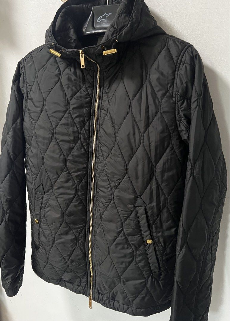 Burberry Brit Quilted Jacket with Hood (Category: Coats, Jackets and Outerwear) located in La Trinidad. Submitted by toronnie22 (Listing ID 1427531083, Image 1). Description: -Burberry brit -in very good condition -NO ISSUE NO ISSUE -Size on tag medium womens -Color rate :10/10 -Color: black metals gold -Dimensions in inches W20 armpit to armpit Length 25 -Selling for 4200 -Baguio location -Ship via j&t only -Open for video call for legitimacy pu