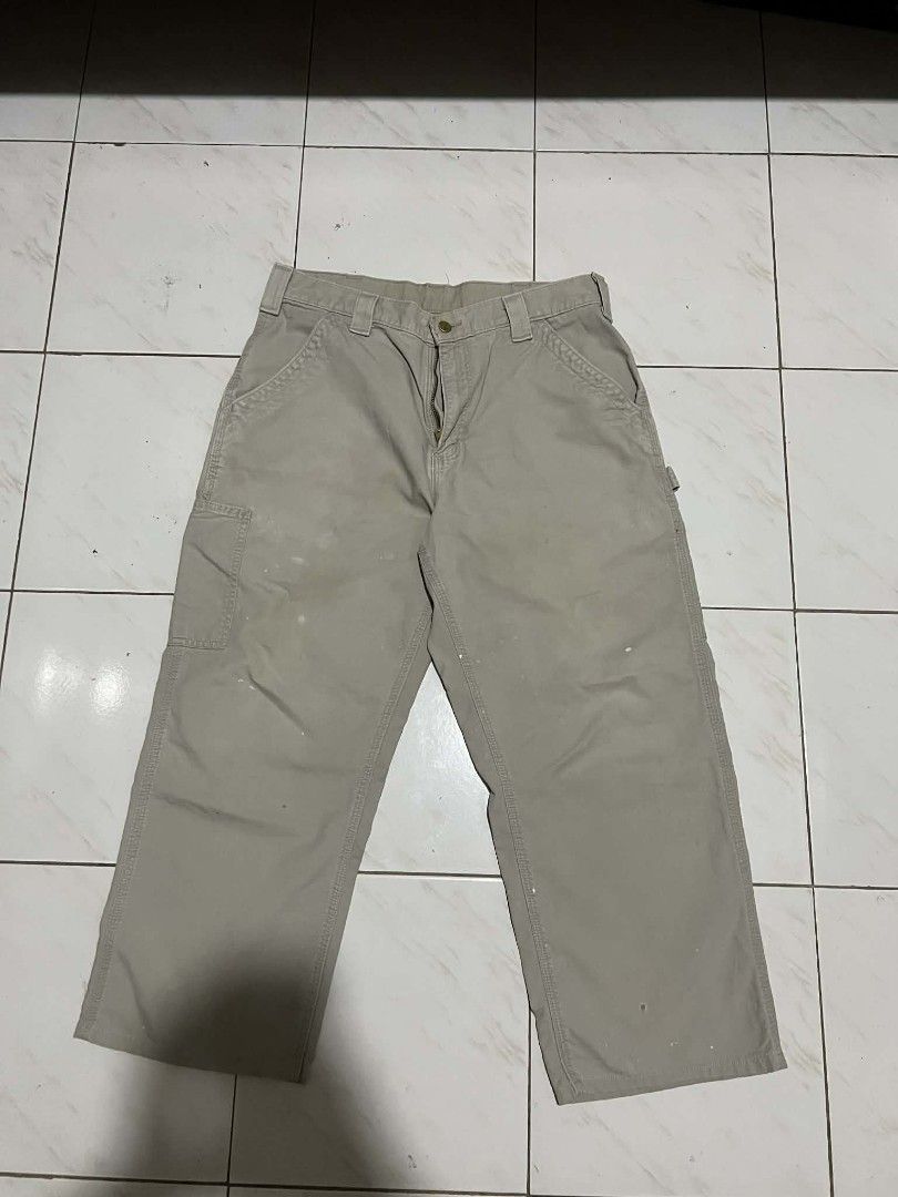 Carhartt B151 Carpenter (Category: Jeans) located in Cabuyao City. Submitted by ruster07 (Listing ID 1427589642, Image 1). Description: Carhartt B151 TAN Made in Mexico dated Aug 2010 actual dimes: 33-34 W 36.5 L 9.5 H Issue: no patch, some paint stains, altered length and 1 pinhole sa right leg j&t courier Butong Cabuyao City Laguna location Meetup: Shell Cabuyao highway near Cabuyao Municipal Hall..