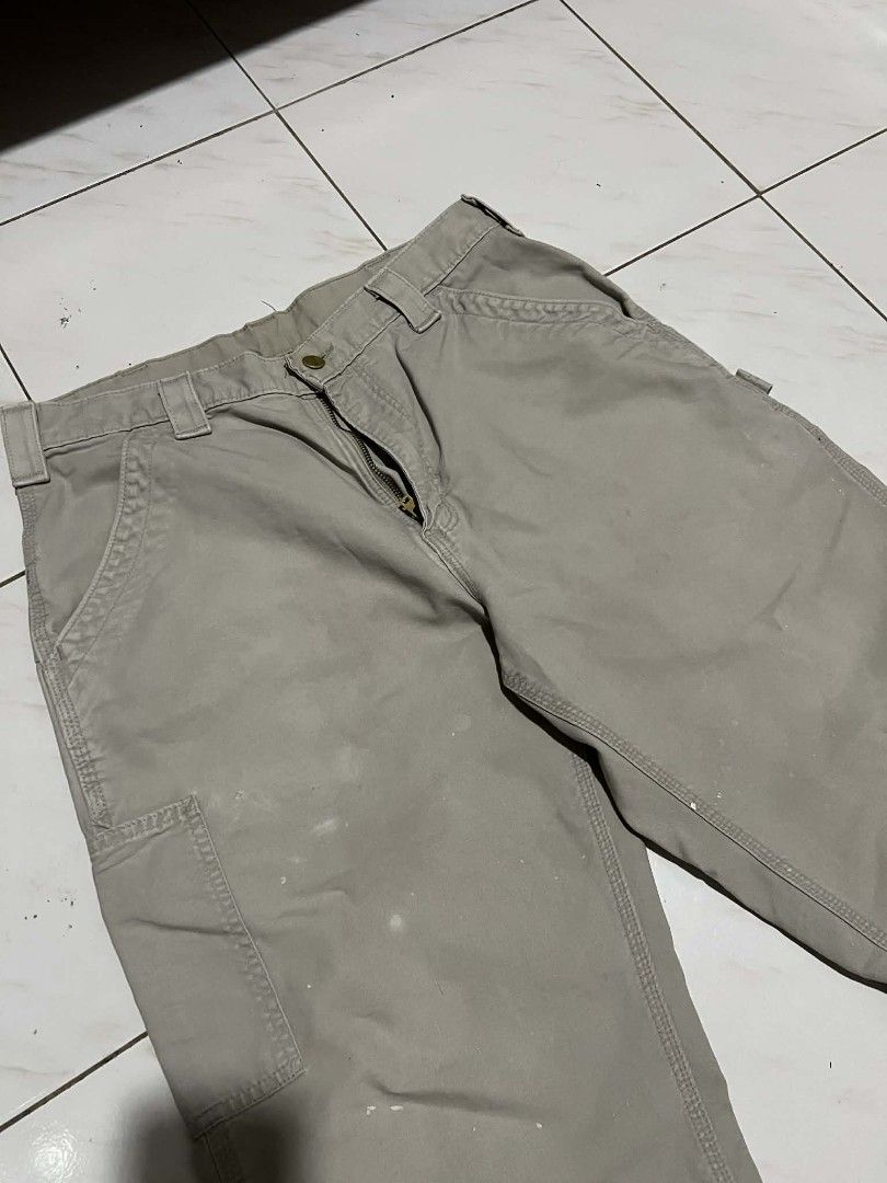 Carhartt B151 Carpenter (Category: Jeans) located in Cabuyao City. Submitted by ruster07 (Listing ID 1427589642, Image 2). Description: Carhartt B151 TAN Made in Mexico dated Aug 2010 actual dimes: 33-34 W 36.5 L 9.5 H Issue: no patch, some paint stains, altered length and 1 pinhole sa right leg j&t courier Butong Cabuyao City Laguna location Meetup: Shell Cabuyao highway near Cabuyao Municipal Hall..