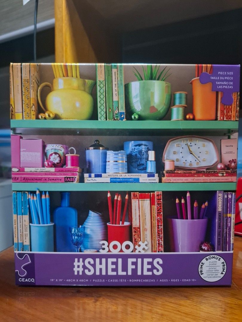 Ceaco #Shelfies 1 (300 Piece Puzzle) (Category: Board Games & Puzzles) located in Manila. Submitted by pineapple.dums (Listing ID 1427599983, Image 1). Description: Brand new and sealed MOP: BDO/Gcash.