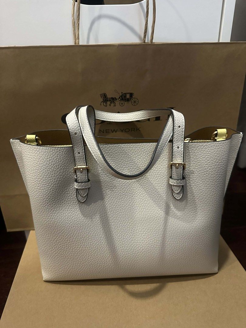 Coach City Tote Bag (Category: Luxury Bags & Wallets) located in Manila. Submitted by alainachu (Listing ID 1427517577, Image 2). Description: Coach Mollie Tote 25 - Chalk Details: Brand New / Never Used Authentic Pebble Leather -4k MOP: GCash or BDO Shipping: J&T or Lalamove.