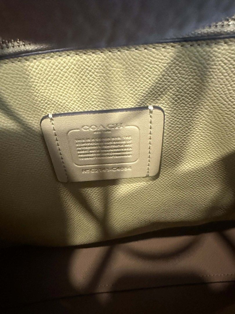 Coach City Tote Bag (Category: Luxury Bags & Wallets) located in Manila. Submitted by alainachu (Listing ID 1427517577, Image 3). Description: Coach Mollie Tote 25 - Chalk Details: Brand New / Never Used Authentic Pebble Leather -4k MOP: GCash or BDO Shipping: J&T or Lalamove.