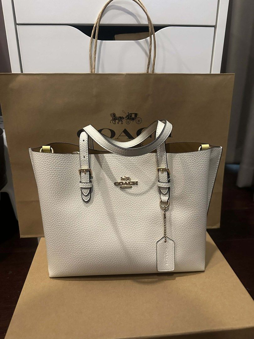 Coach City Tote Bag (Category: Luxury Bags & Wallets) located in Manila. Submitted by alainachu (Listing ID 1427517577, Image 1). Description: Coach Mollie Tote 25 - Chalk Details: Brand New / Never Used Authentic Pebble Leather -4k MOP: GCash or BDO Shipping: J&T or Lalamove.