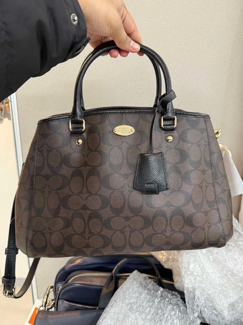 Coach Minetta Crossbody/Satchel (Category: Luxury Bags & Wallets) located in Muntinlupa City. Submitted by yang2nd (Listing ID 1427583310, Image 1). Description: ✔️💯% Authentic Item ✔️💯% Looks Like New ✔️💯% Smooth Leather ✔️dark Brown/Mahogany” monogram pattern ✔️polished gold-tone metal ▪️Origin: Japan🇯🇵 ▪️For Reservation: 50%DP.