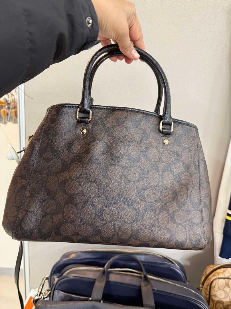 Coach Minetta Crossbody/Satchel (Category: Luxury Bags & Wallets) located in Muntinlupa City. Submitted by yang2nd (Listing ID 1427583310, Image 2). Description: ✔️💯% Authentic Item ✔️💯% Looks Like New ✔️💯% Smooth Leather ✔️dark Brown/Mahogany” monogram pattern ✔️polished gold-tone metal ▪️Origin: Japan🇯🇵 ▪️For Reservation: 50%DP.