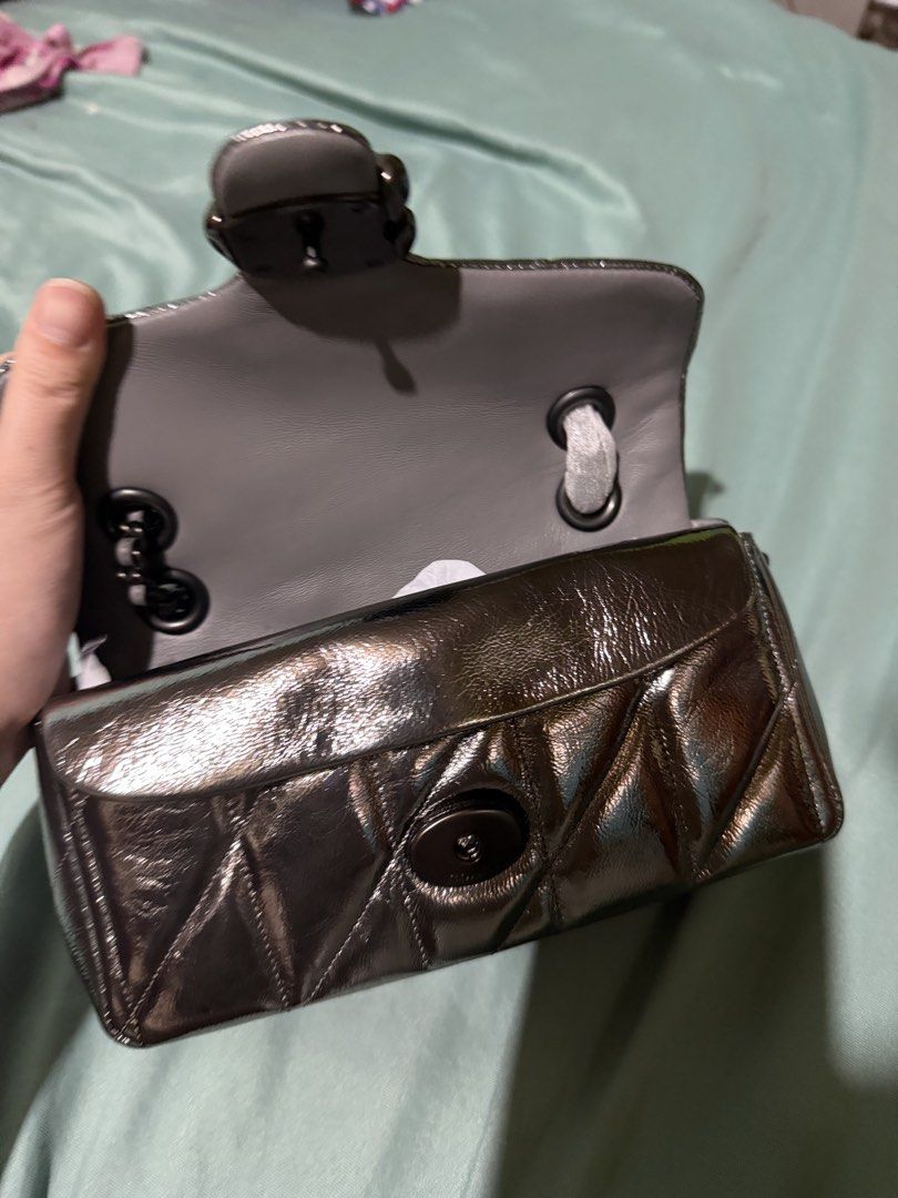 Coach Quilted Tabby 20 Metallic Anthracite Gray (Category: Shoulder Bags) located in Manila. Submitted by _boxofelle (Listing ID 1422546041, Image 2). Description: No flaws with dust bag. Selling it low nalang po. Original. Authentic. Price still nego just send me a message Rfs: Declutter. Not my syle.