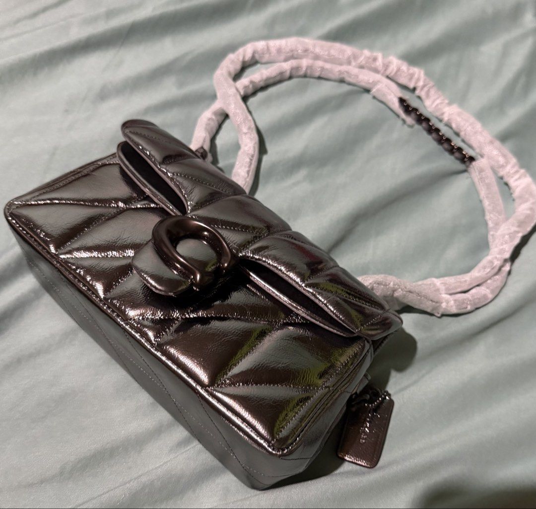 Coach Quilted Tabby 20 Metallic Anthracite Gray (Category: Shoulder Bags) located in Manila. Submitted by _boxofelle (Listing ID 1422546041, Image 1). Description: No flaws with dust bag. Selling it low nalang po. Original. Authentic. Price still nego just send me a message Rfs: Declutter. Not my syle.