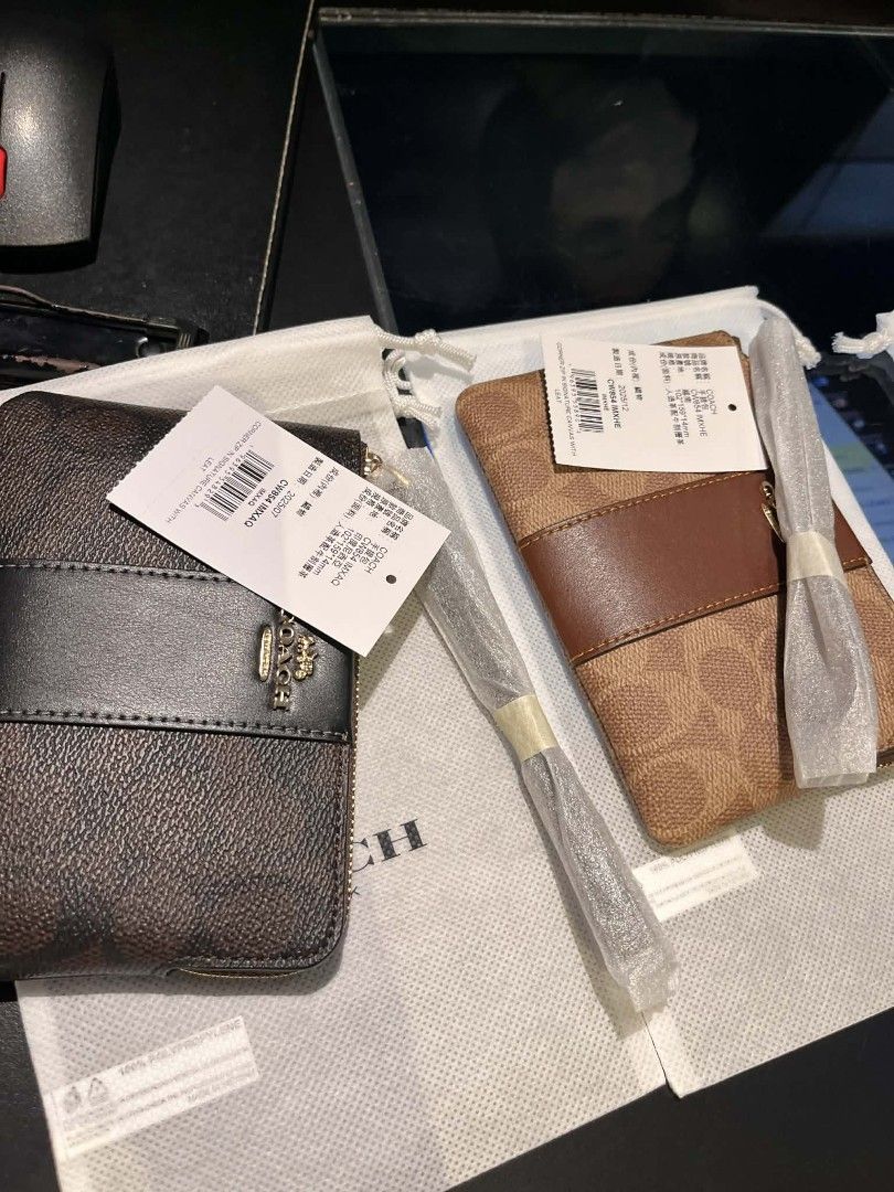 Coach Signature Wallet (Category: Luxury Bags & Wallets) located in Dipolog. Submitted by queenibee01 (Listing ID 1427592904, Image 1). Description: Authentic Coach wallet. Features a brown leather design with the Coach signature pattern. Includes a wrist strap. Comes with original tags and packaging. Perfect for everyday use or as a gift. The wallet has multiple compartments for cards and cash..