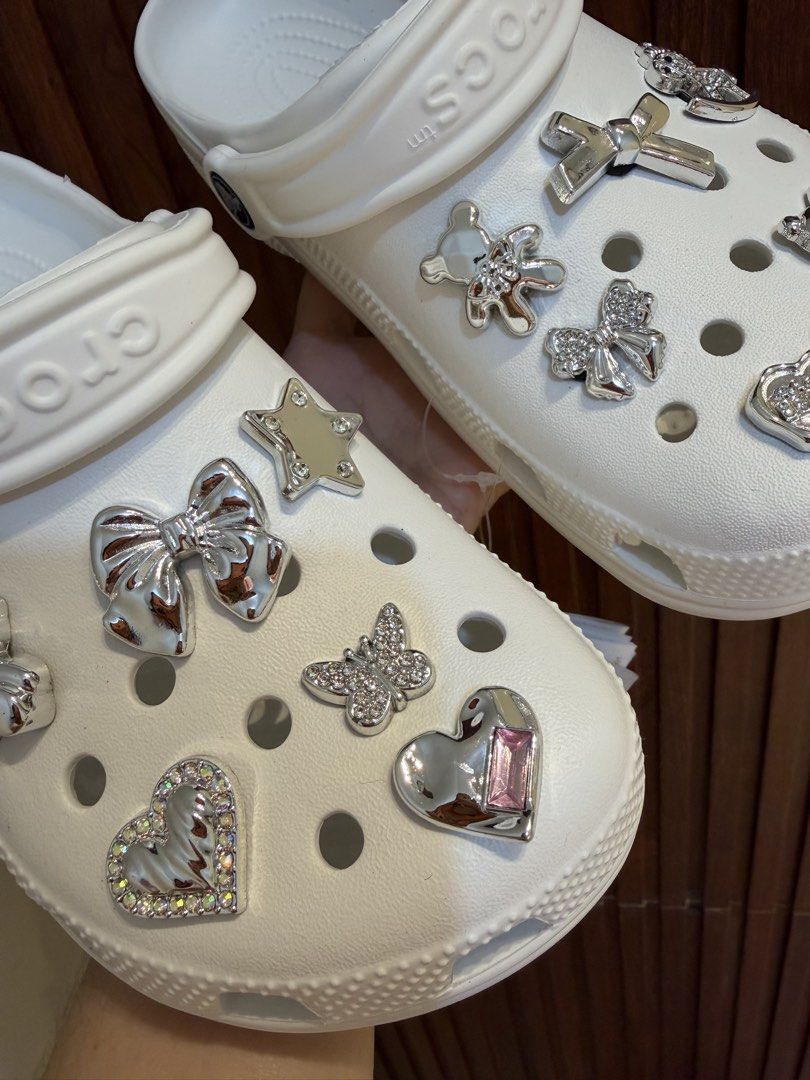 Crocs Classic Clog White with Jibbitz Charms (Category: Slippers and slides) located in Bulacan. Submitted by stepnstyle8888 (Listing ID 1427512933, Image 2). Description: Size 6-9 .