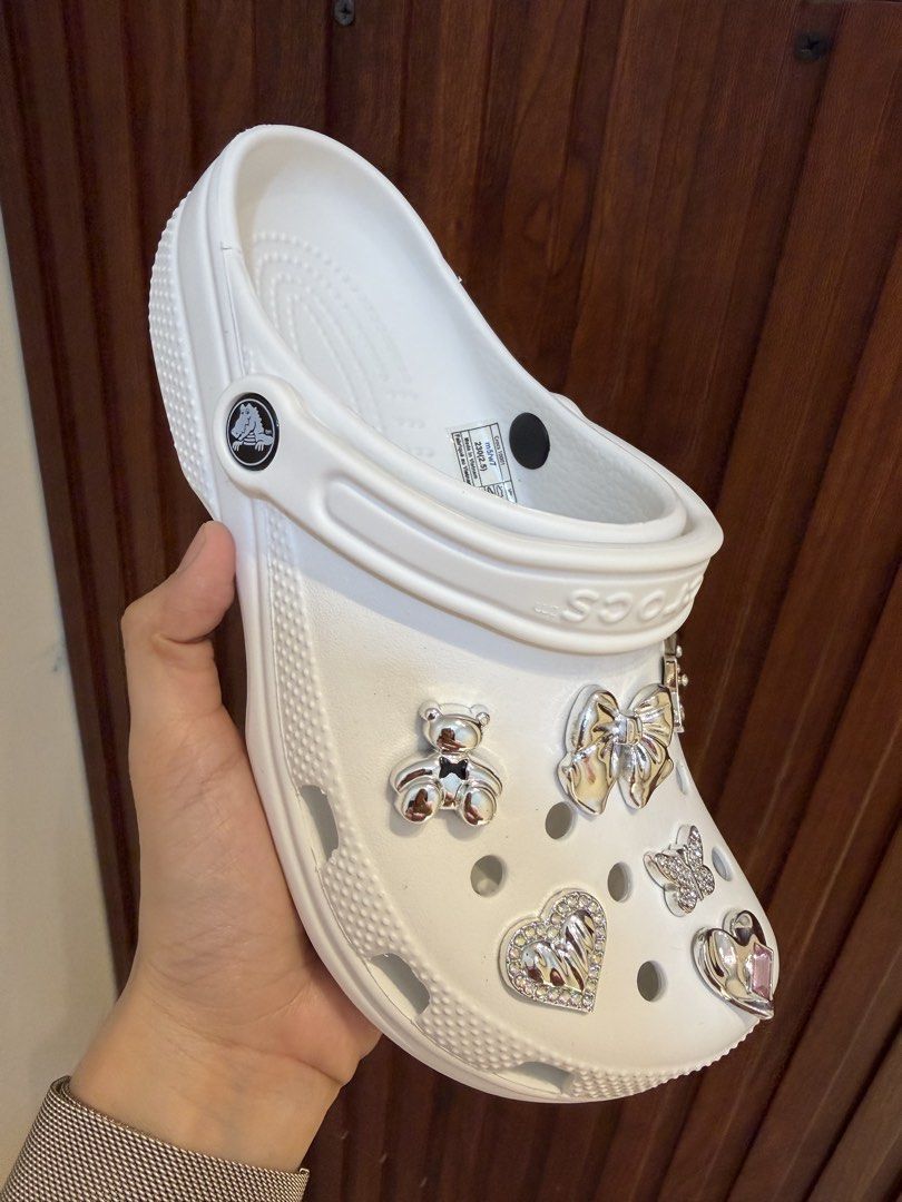 Crocs Classic Clog White with Jibbitz Charms (Category: Slippers and slides) located in Bulacan. Submitted by stepnstyle8888 (Listing ID 1427512933, Image 3). Description: Size 6-9 .