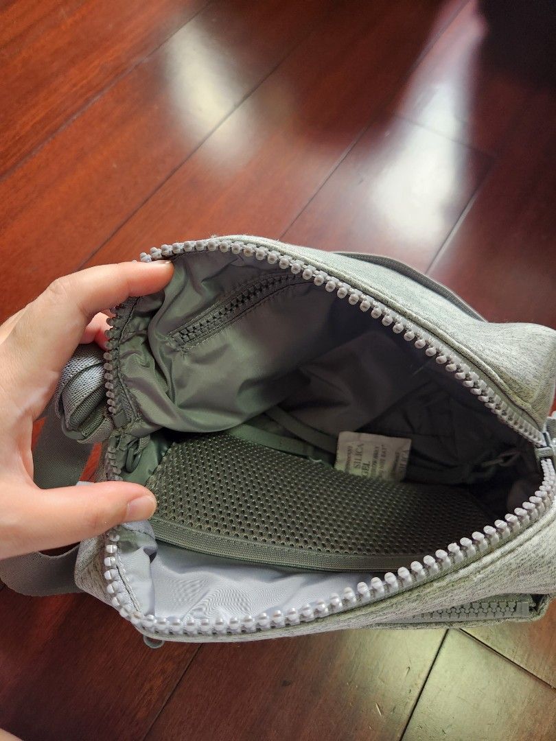 Dagne Dover Ace Crossbody Bag (Category: Cross-body Bags) located in Makati City. Submitted by mikamix (Listing ID 1427501390, Image 2). Description: Dagne Dover Ace crossbody bag features a gray exterior with a zippered main compartment and an adjustable strap. The bag has a front pocket and a mesh interior pocket. The interior is lined with a gray fabric..