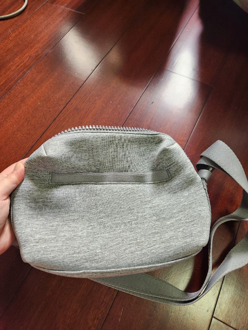 Dagne Dover Ace Crossbody Bag (Category: Cross-body Bags) located in Makati City. Submitted by mikamix (Listing ID 1427501390, Image 3). Description: Dagne Dover Ace crossbody bag features a gray exterior with a zippered main compartment and an adjustable strap. The bag has a front pocket and a mesh interior pocket. The interior is lined with a gray fabric..