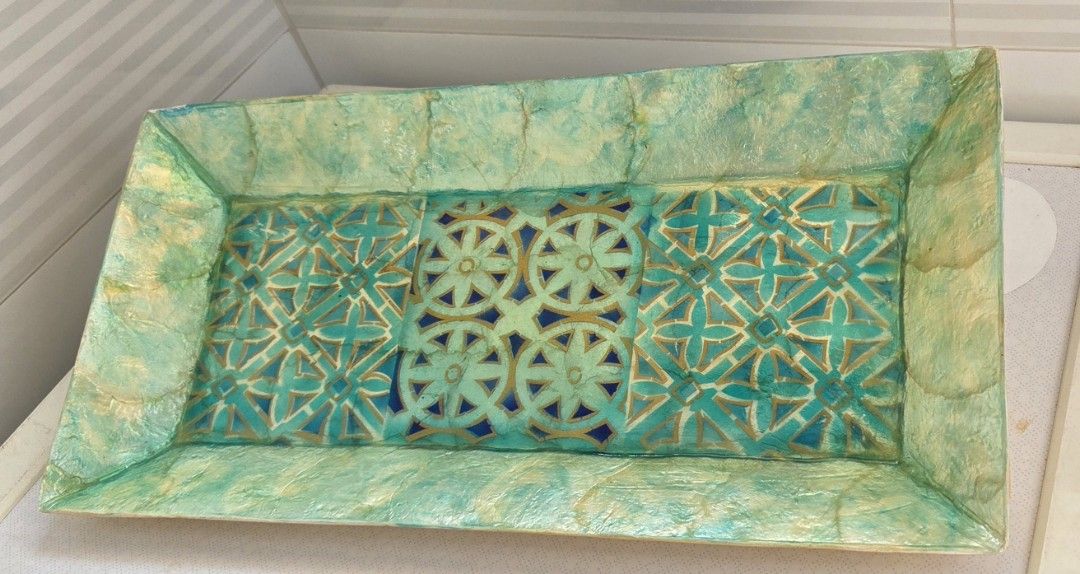 Decorative Rectangular Seashell Tray (Category: Other Home Decor) located in Singapore. Submitted by happiness09 (Listing ID 1427532499, Image 2). Description: Handmade turquoise seashell tray. Beautiful and elegant with unique designs. Natural vibrant colour with a mix of hand-painted gold designs. Ideal for display on its own or displaying decorative items. Length: est 40cm Breadth: est 20cm.